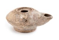 A Roman Terra Cotta Oil Lamp Height 2 x diameter 4 1/2 inches. — CIRCA 1ST-3RD CENTURY C.E.