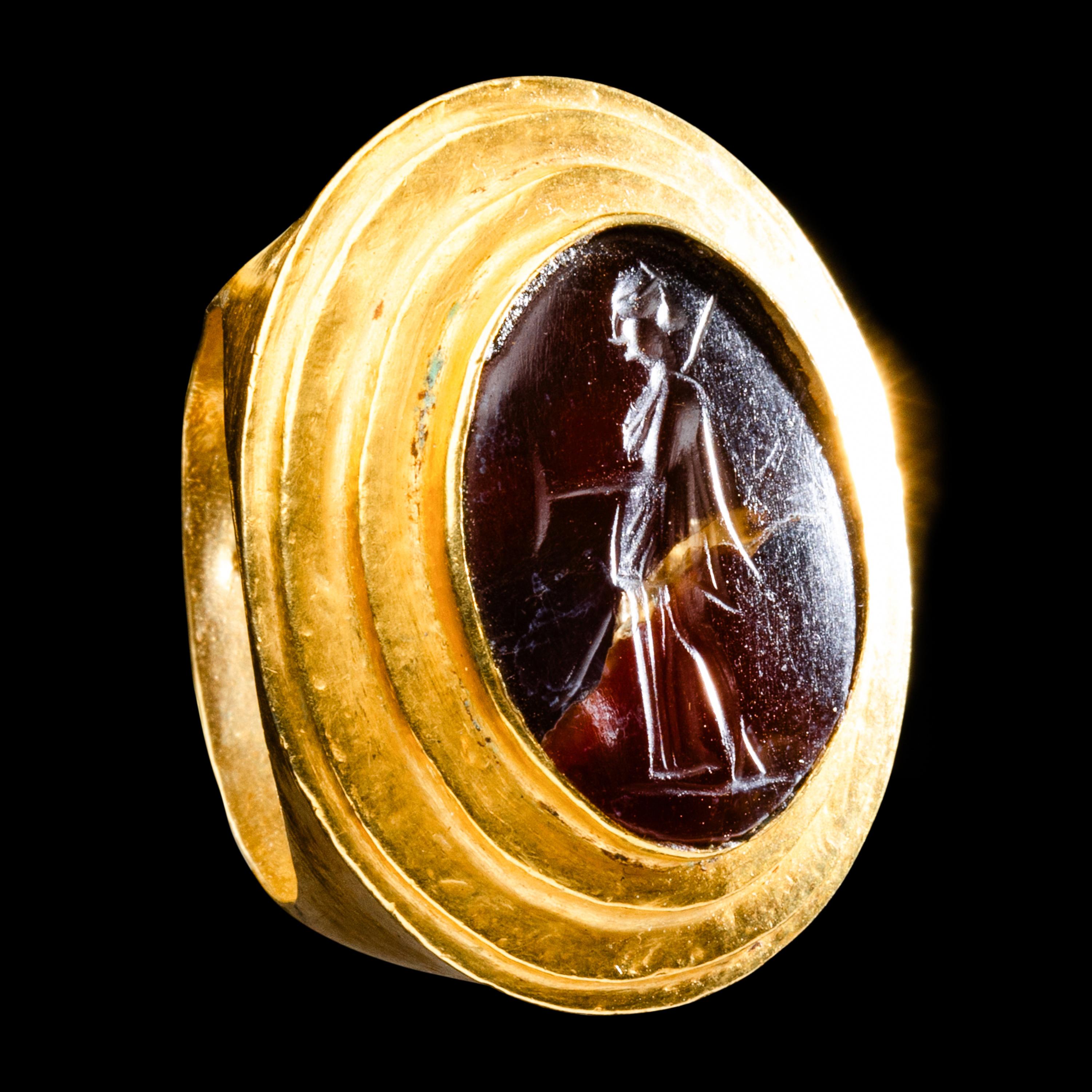 A Greek Gold and Carnelian Finger Ring with the Goddess Artemis