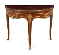 A Louis XV Style Gilt Bronze Mounted Kingwood Flip-Top Table by François Linke