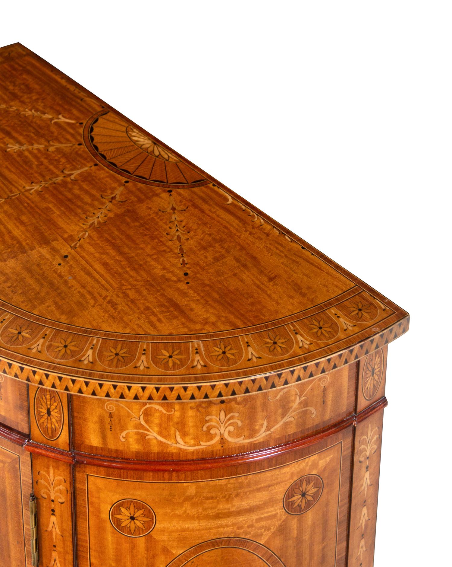 An Adam Style Satinwood and Marquetry Demilune Cabinet
