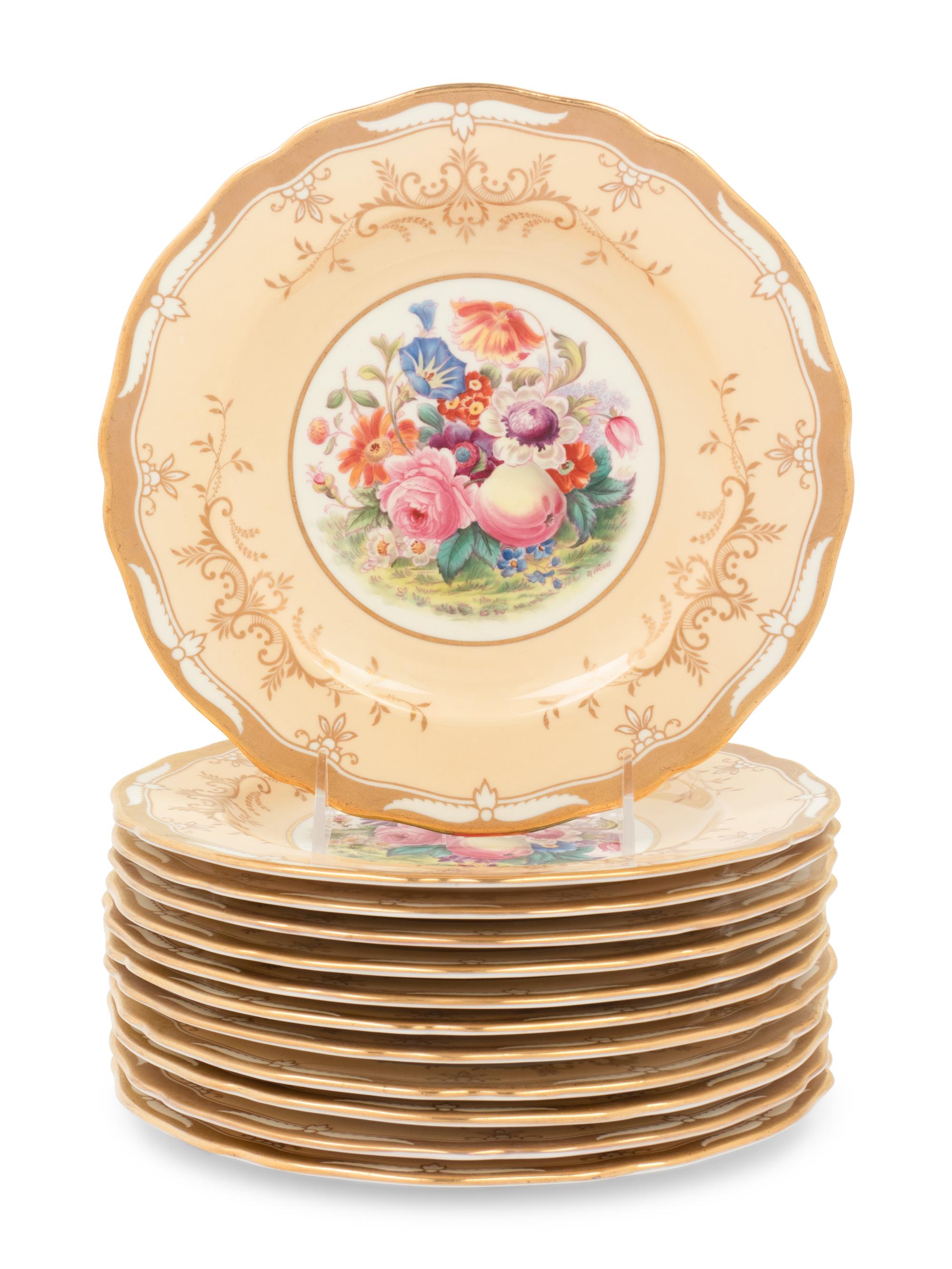A Set of Twelve Spode Hand Painted Parcel Gilt Dinner Plates