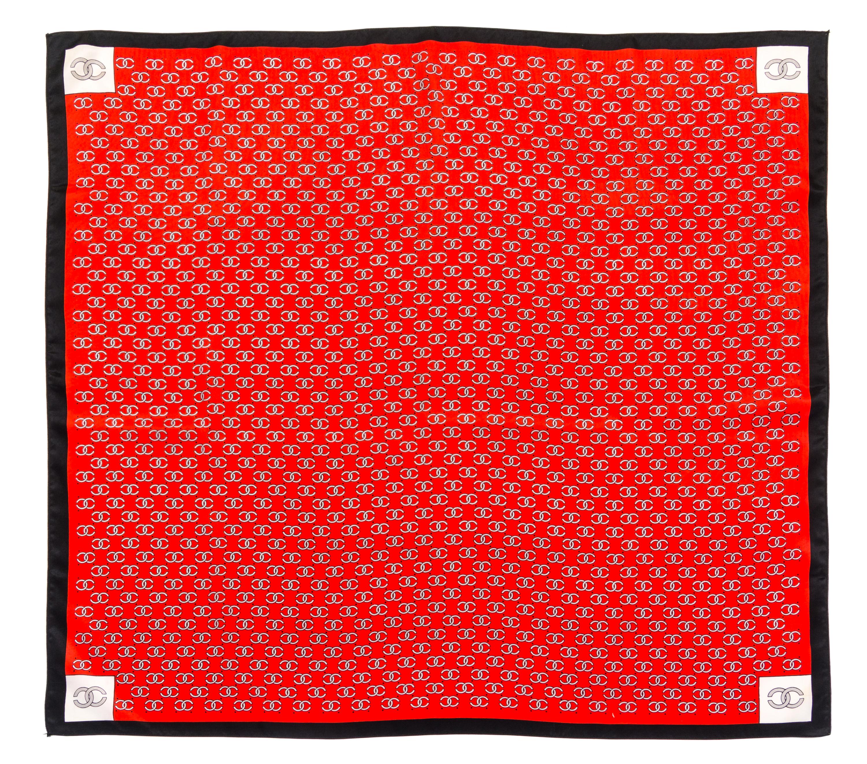 A Chanel Red Silk Scarf, 30" x 30".