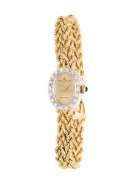 BAUME & MERCIER, YELLOW GOLD AND DIAMOND WATCH