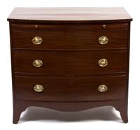 A George III Mahogany Bowfront Bachelor's Chest Height 33 1/4 x width 37 x depth 22 1/2 inches. — 19TH CENTURY