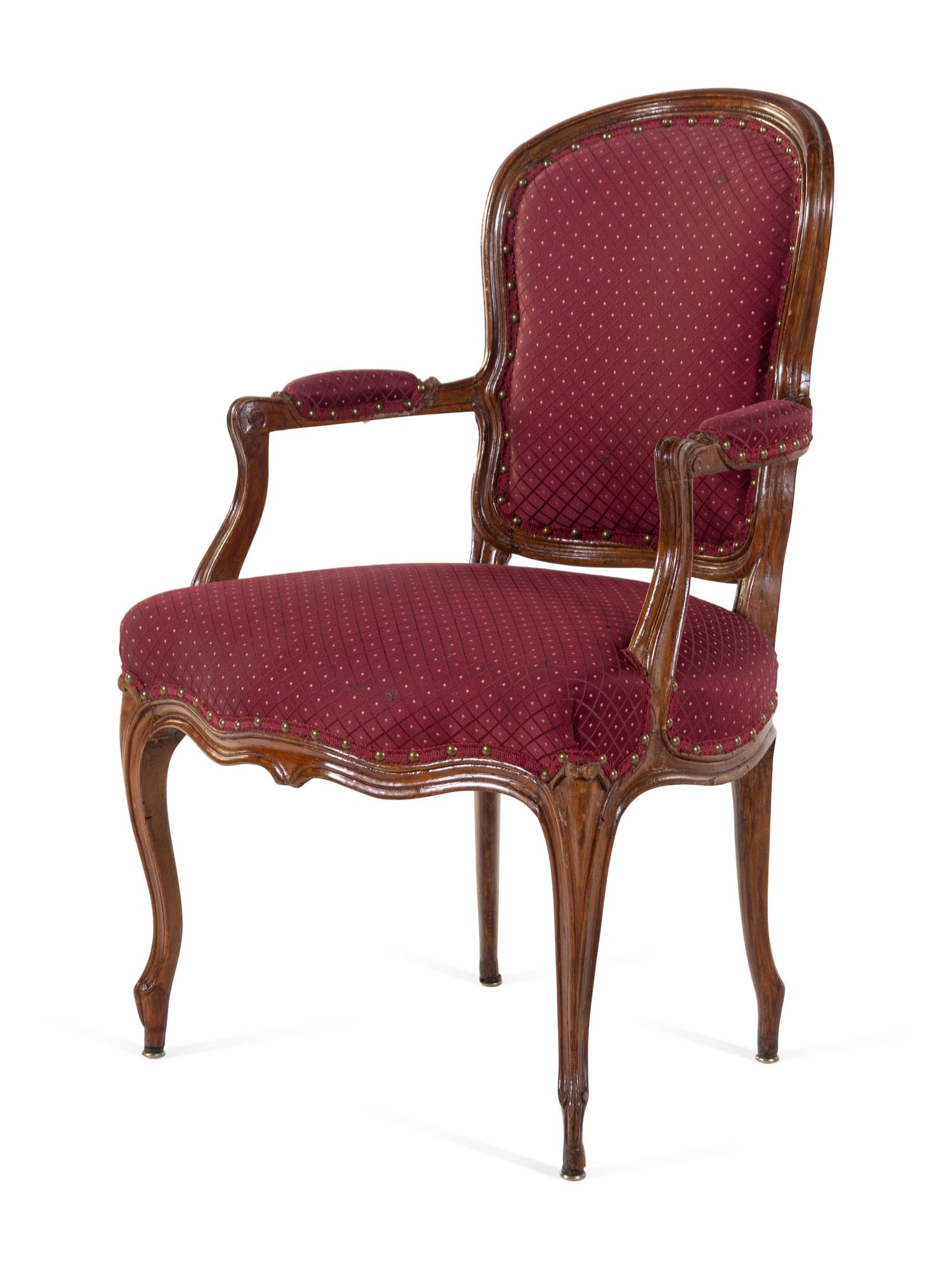 A Group of Four Louis XV Walnut Chairs