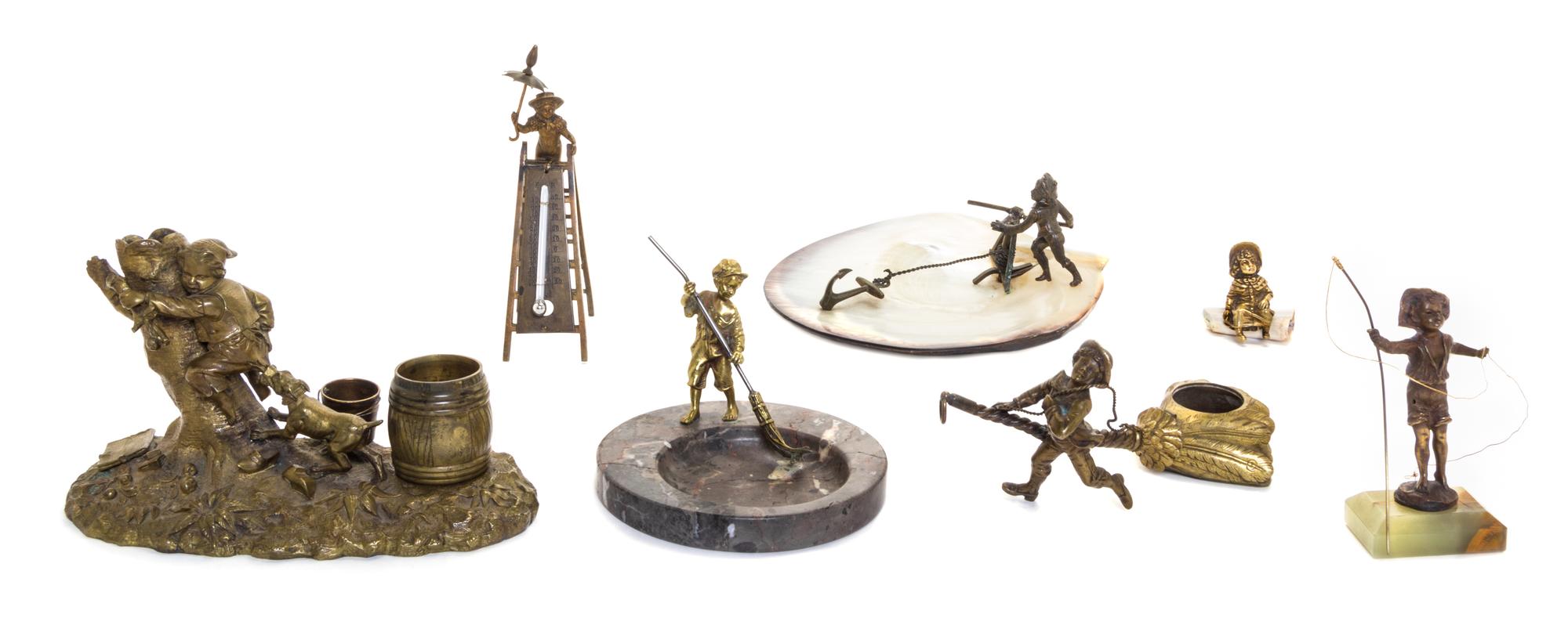 A Collection of Bronze Figural Groups Height of first 4 1/4 inches.