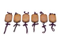 A Set of Six Yellow Bronze Screen Weights