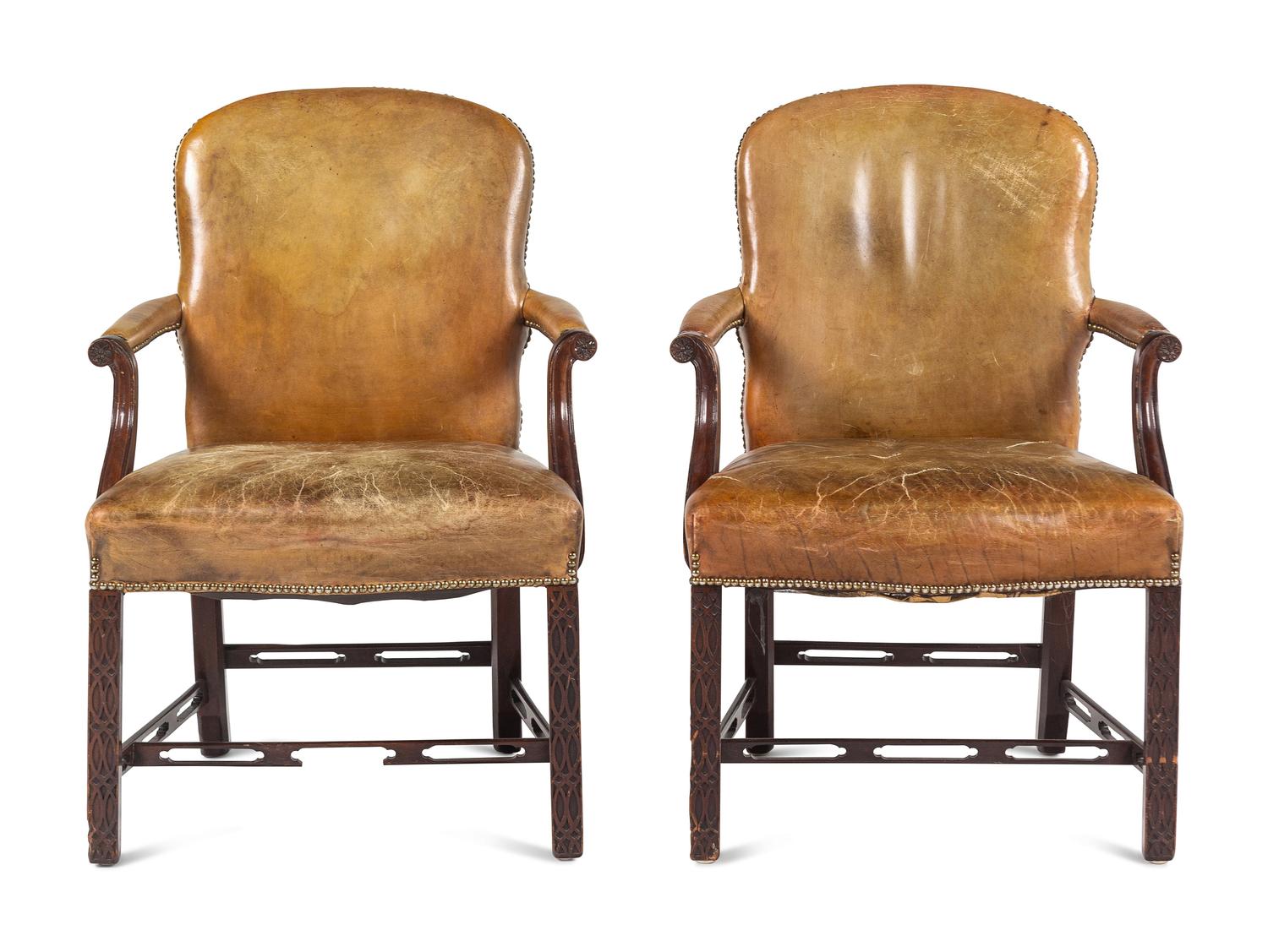 A Pair of George III Style Leather-Upholstered Mahogany Armchairs