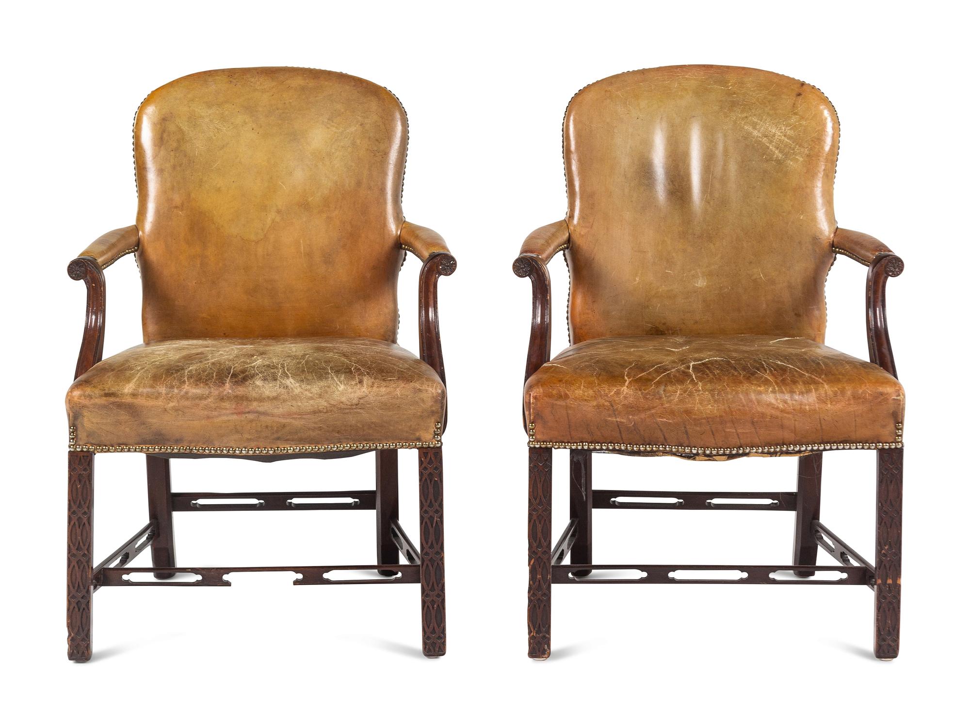A Pair of George III Style Leather-Upholstered Mahogany Armchairs