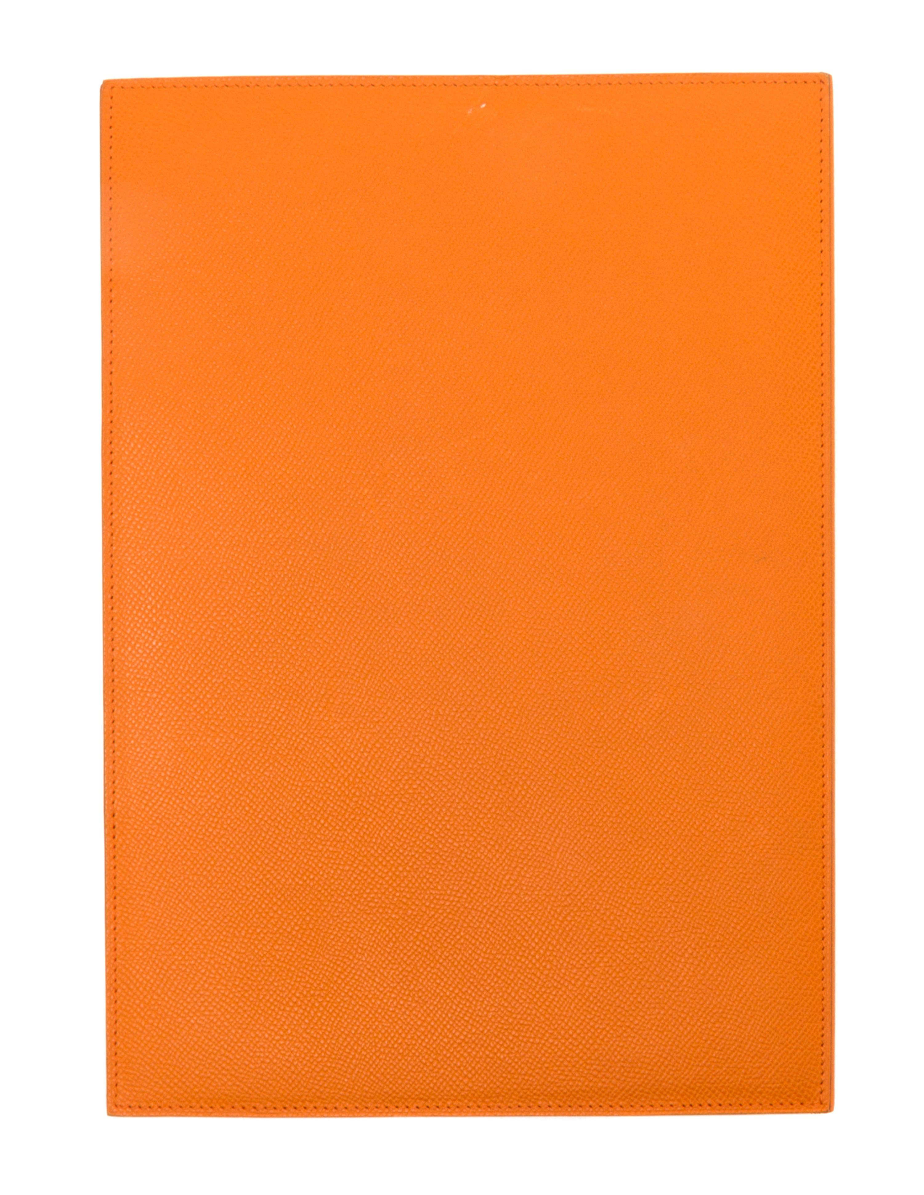 An Hermes Orange Leather Folio, 9" x 12.5" x .25".