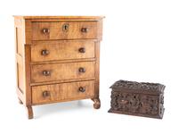 A Miniature Classical Chest of Drawers and Carved Box