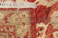 An Orange Oushak Wool Rug