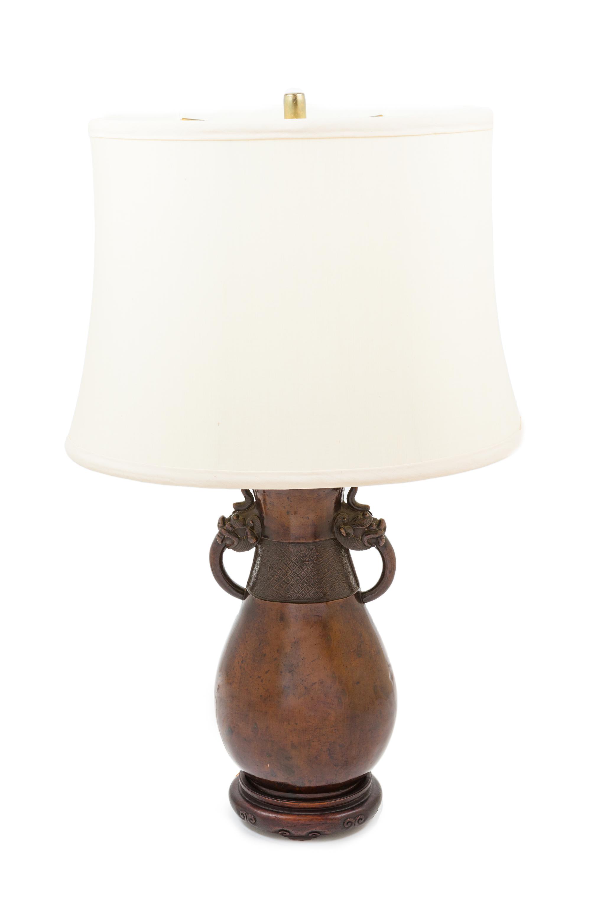 A Japanese Bronzed Metal Vase Mounted as a Lamp
