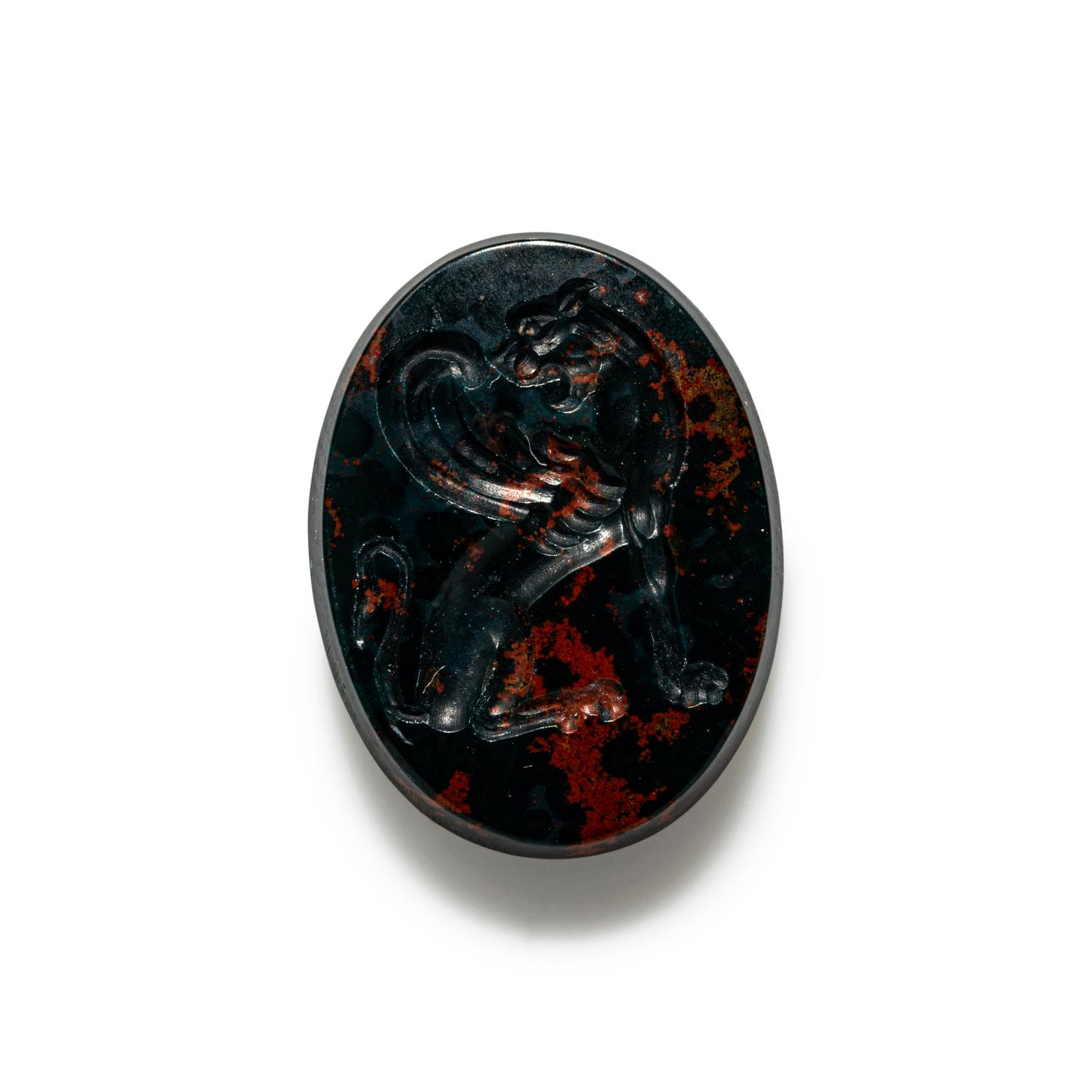A Greco-Persian Style Bloodstone Intaglio with a Winged Griffin