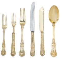 An English Gilt Silver Dinner Service, London and Sheffield, England, 1891-1903, English King pattern, comprising: 18 place spoons 14 d