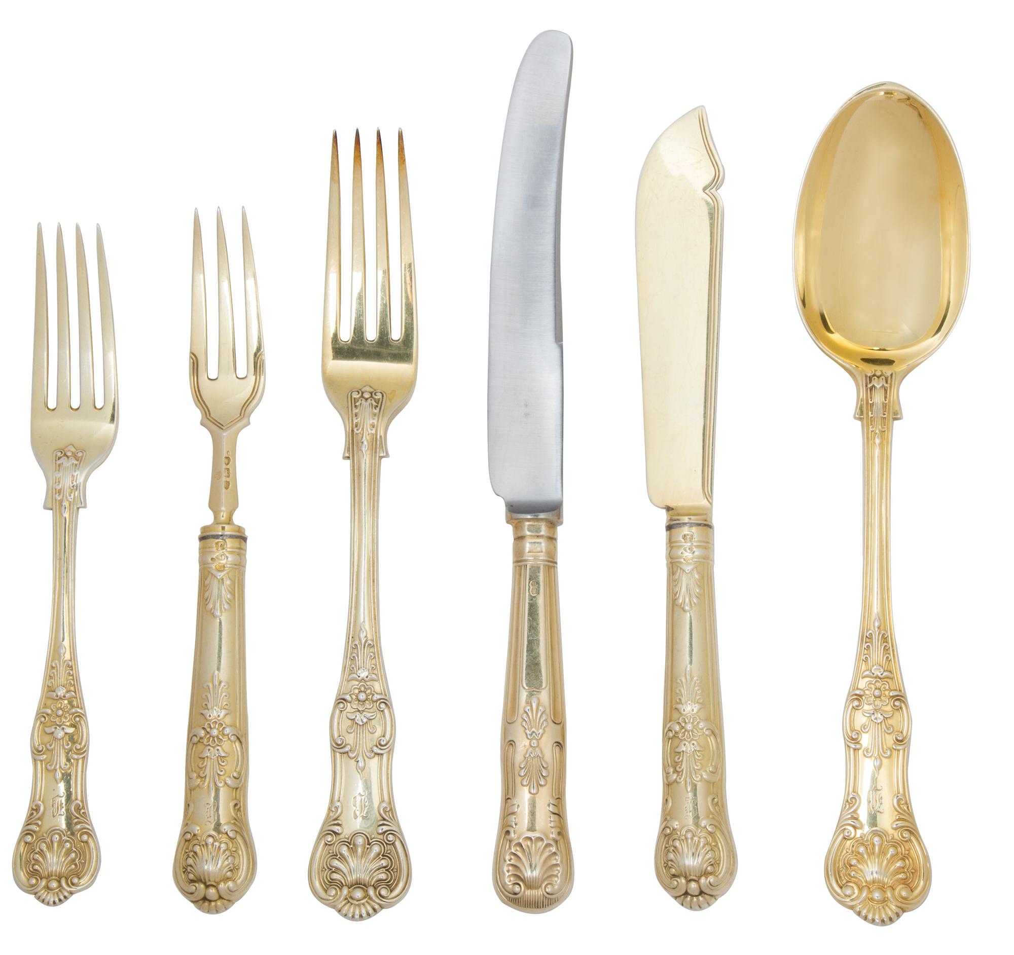 An English Gilt Silver Dinner Service, London and Sheffield, England, 1891-1903, English King pattern, comprising: 18 place spoons 14 d