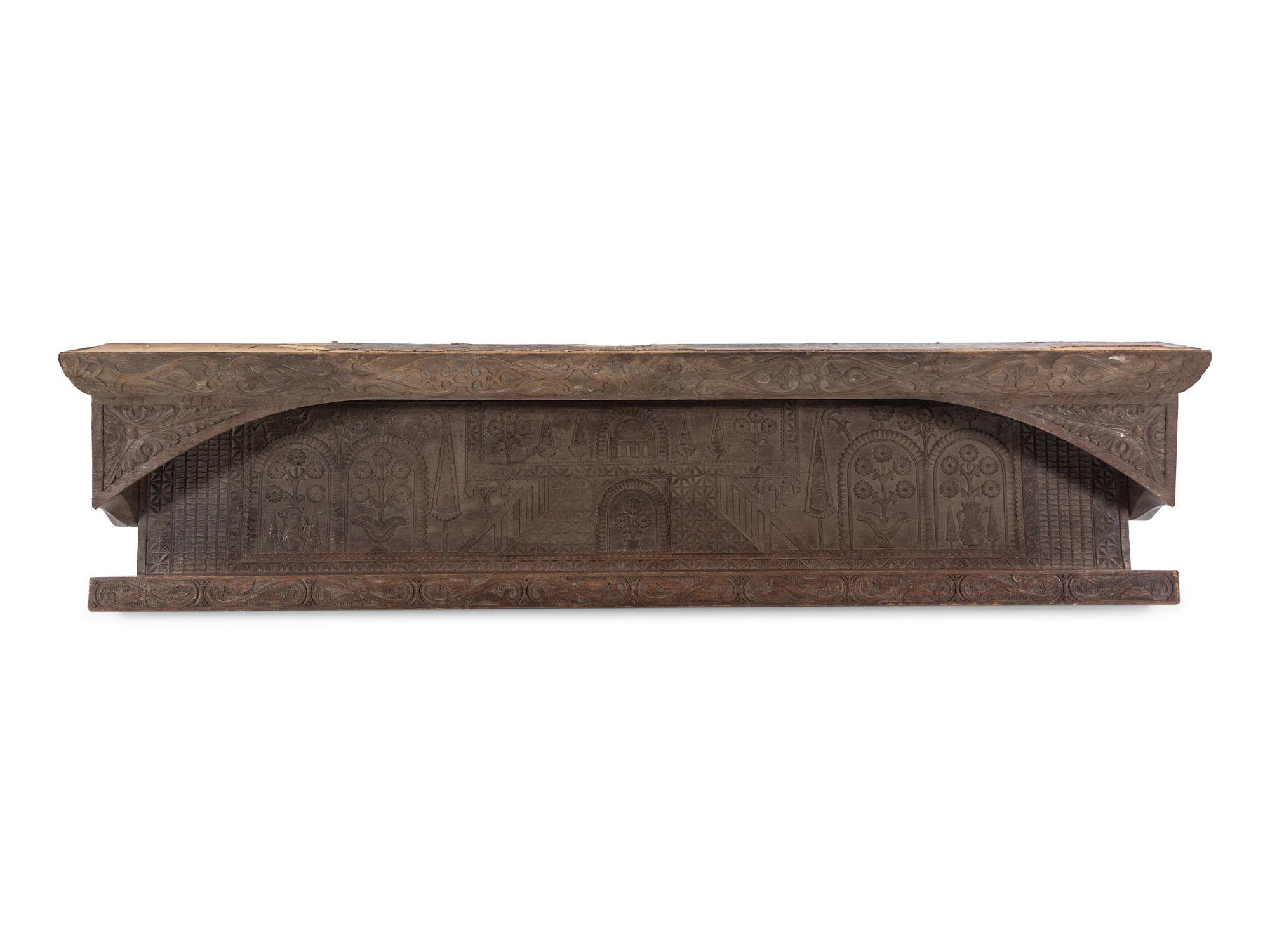 An English Carved Oak Hanging Rack in the William and Mary Taste