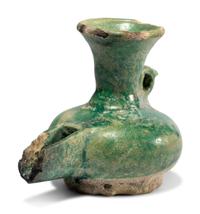 A Persian Green Glazed Vessel