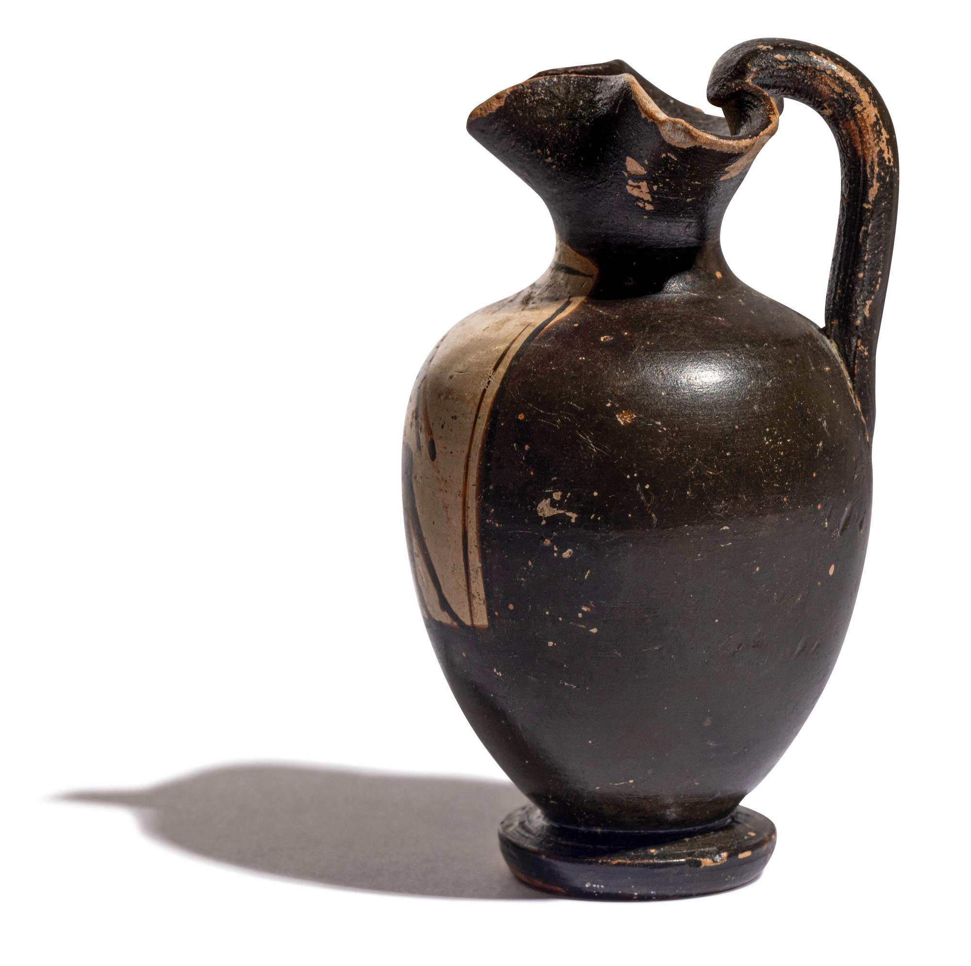 A Greek Black-Figured Trefoil Oinochoe