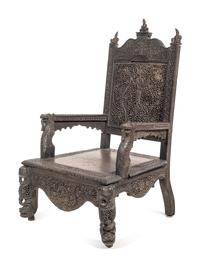 A Burmese Carved Hardwood Armchair