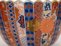 An Associated Pair of Large Japanese Imari Porcelain Punch Bowls
