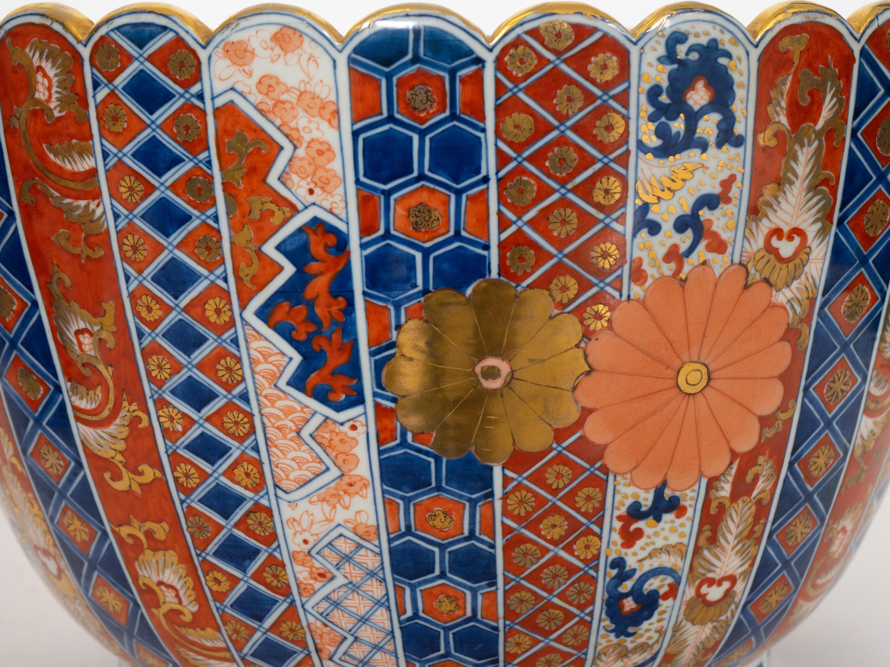 An Associated Pair of Large Japanese Imari Porcelain Punch Bowls