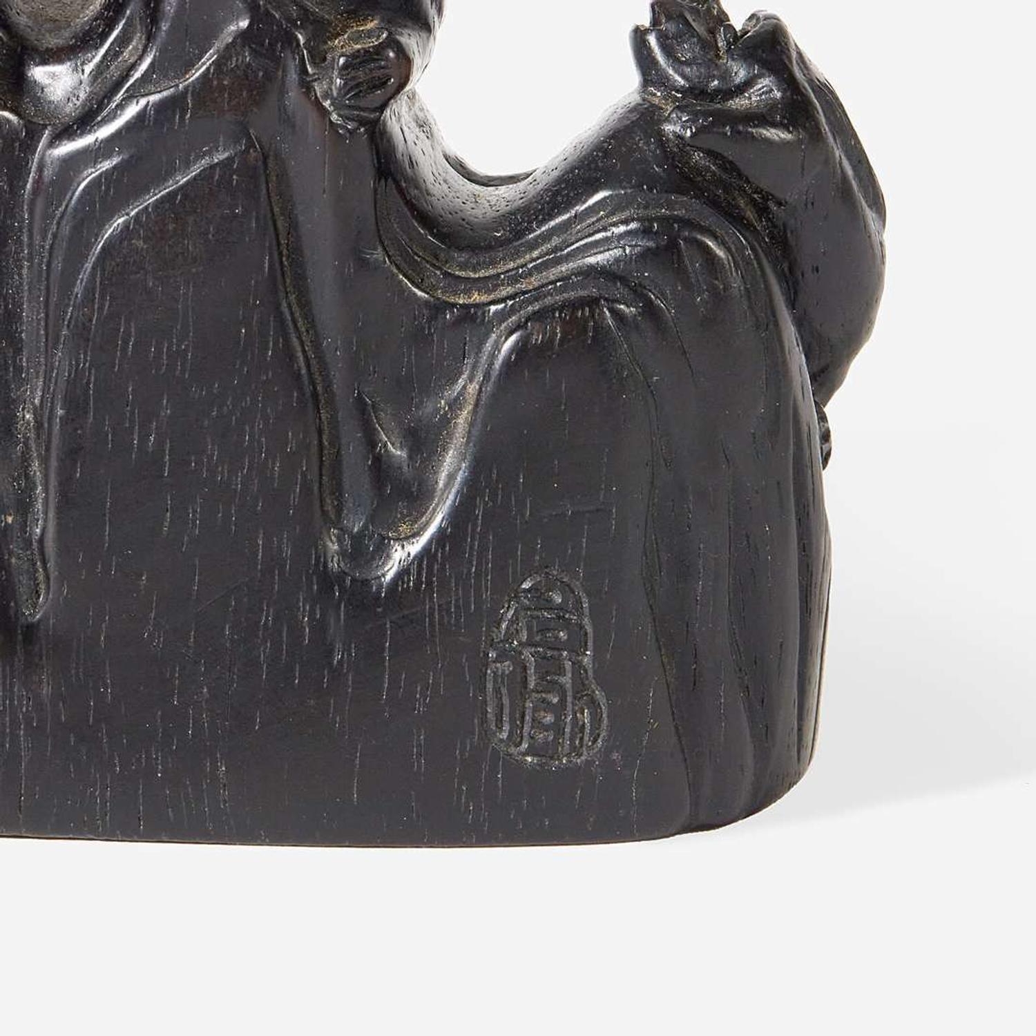 A Chinese carved hardwood brushrest probably 17th/18th Century