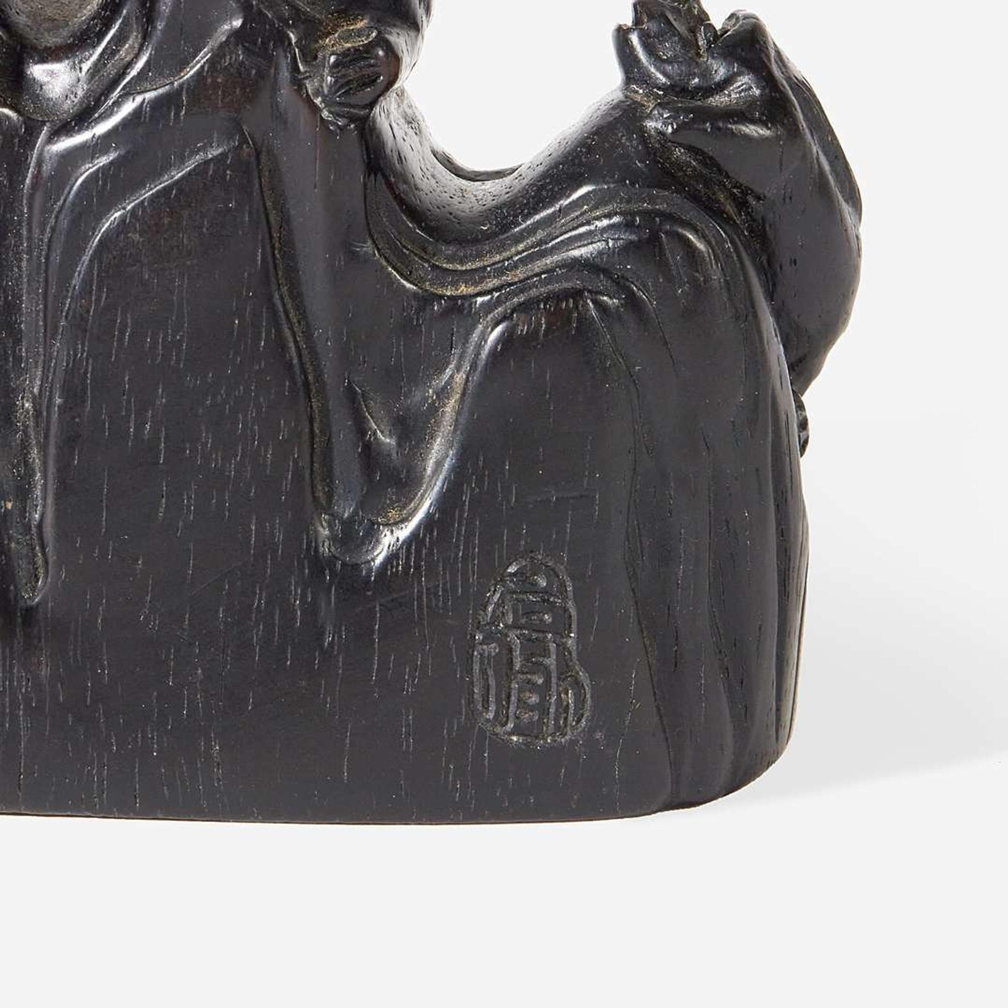 A Chinese carved hardwood brushrest probably 17th/18th Century