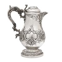 A Belgian Repoussé Silver Ewer