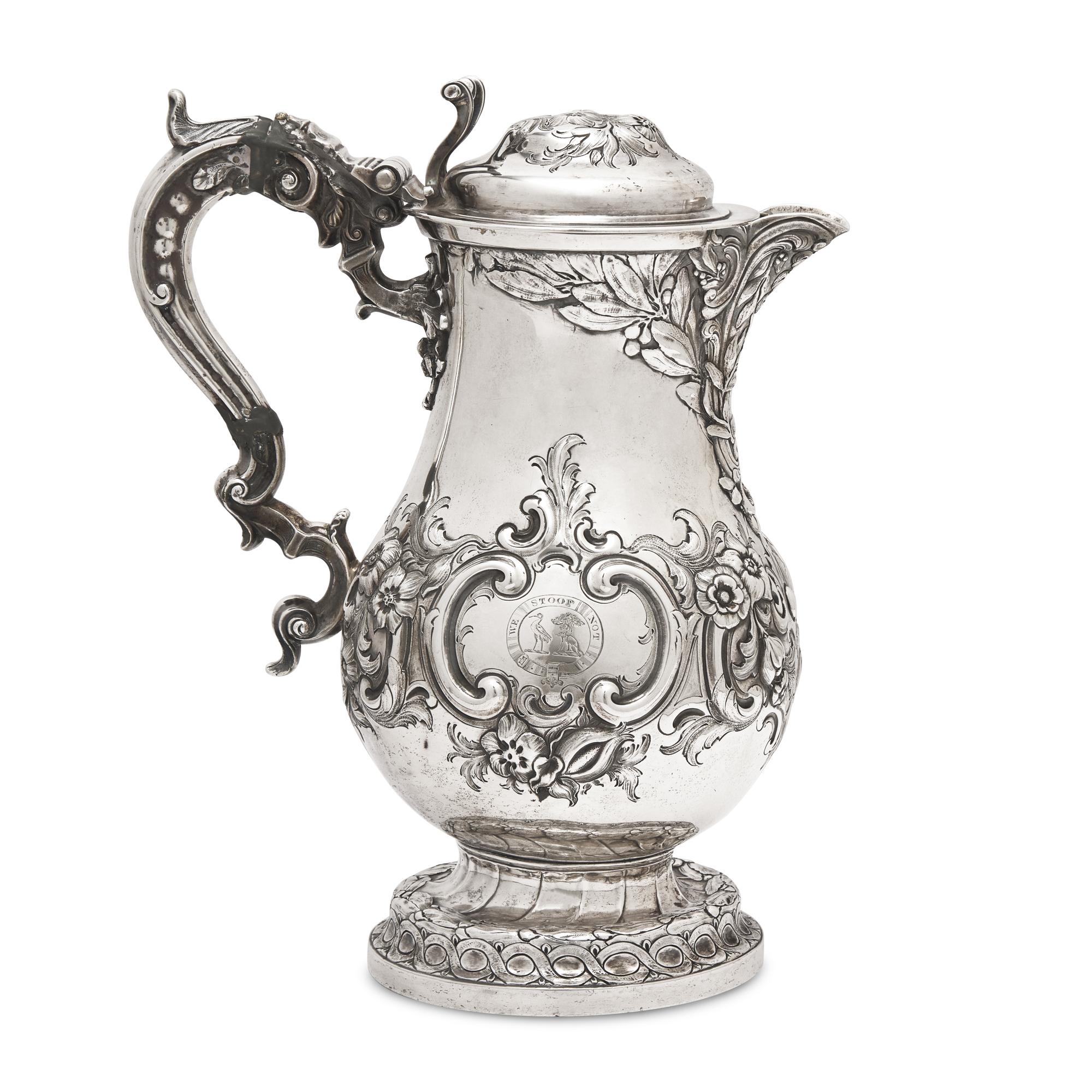A Belgian Repoussé Silver Ewer