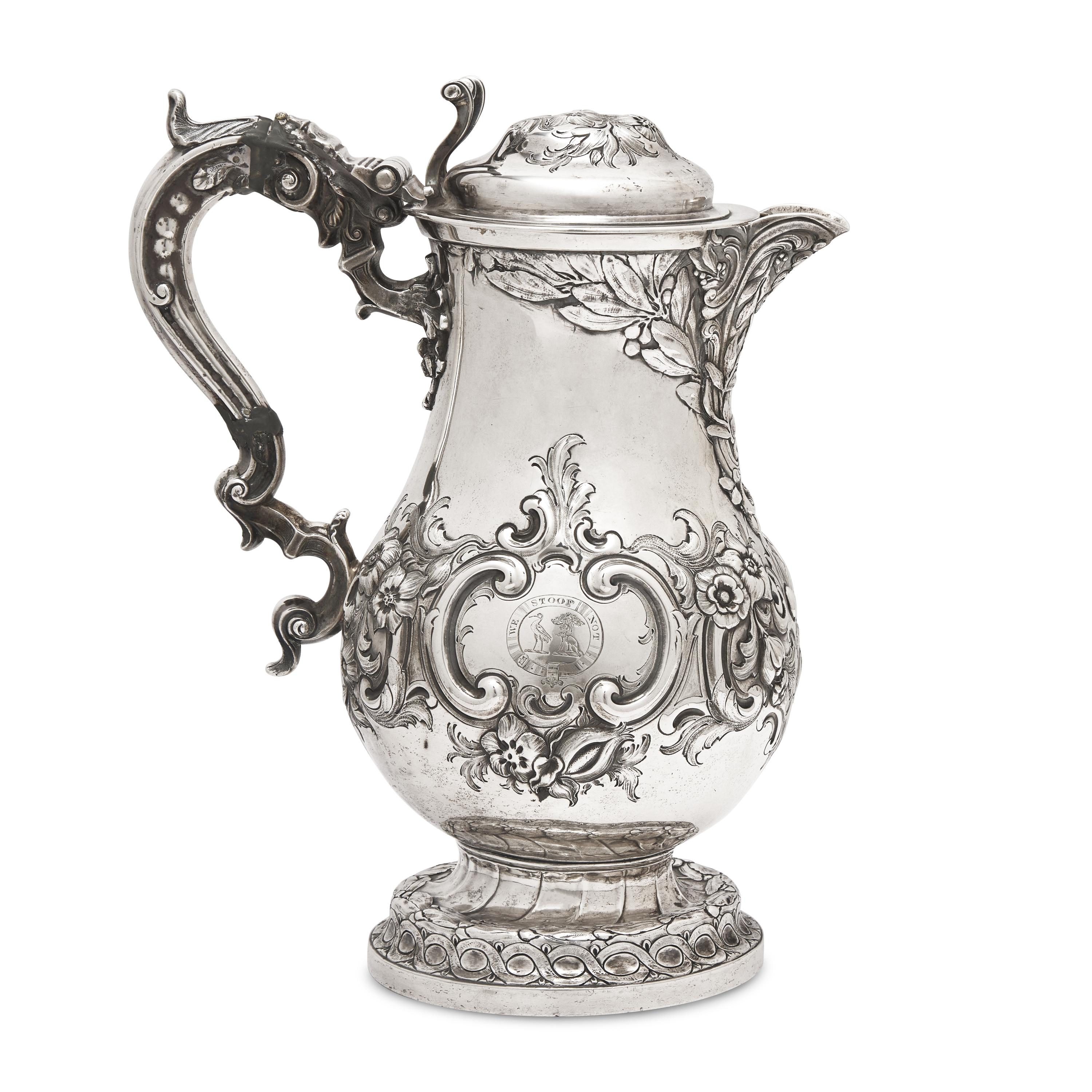 A Belgian Repoussé Silver Ewer