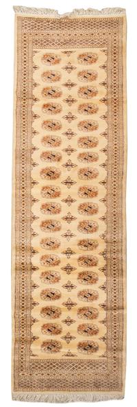 A Bokhara Wool Runner, 10 feet 5 inches x 3 feet 2 inches.