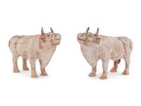 A Pair of Chinese Painted Pottery Figures of Oxen