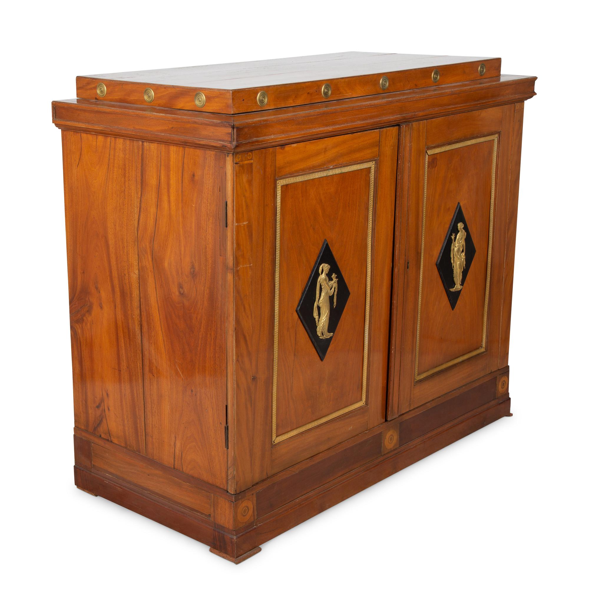 A Continental Neoclassical Mahogany Cabinet