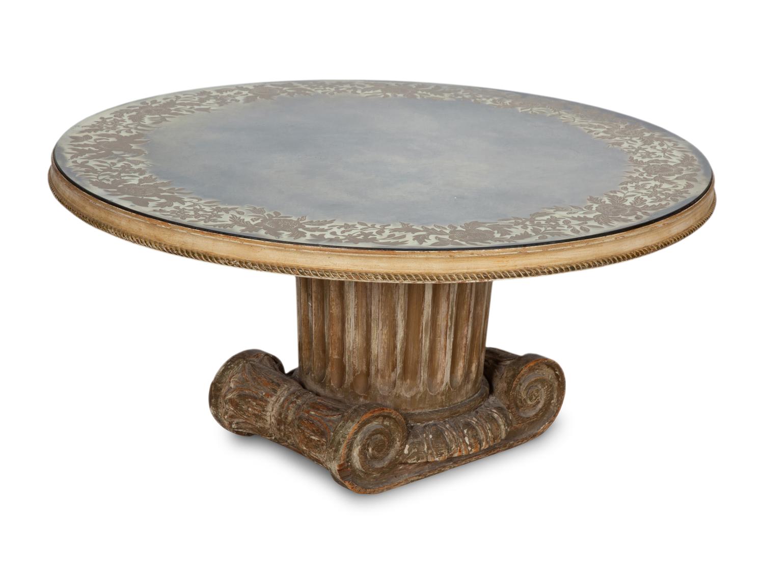 A Neoclassical Style Carved Wood Columnar Base Table with Gilt Decorated Smoke Glass Top