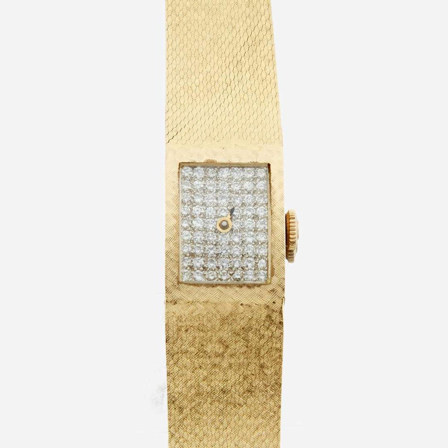 A lady's gold and diamond bracelet wristwatch, Omega