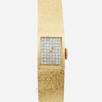 A lady's gold and diamond bracelet wristwatch, Omega
