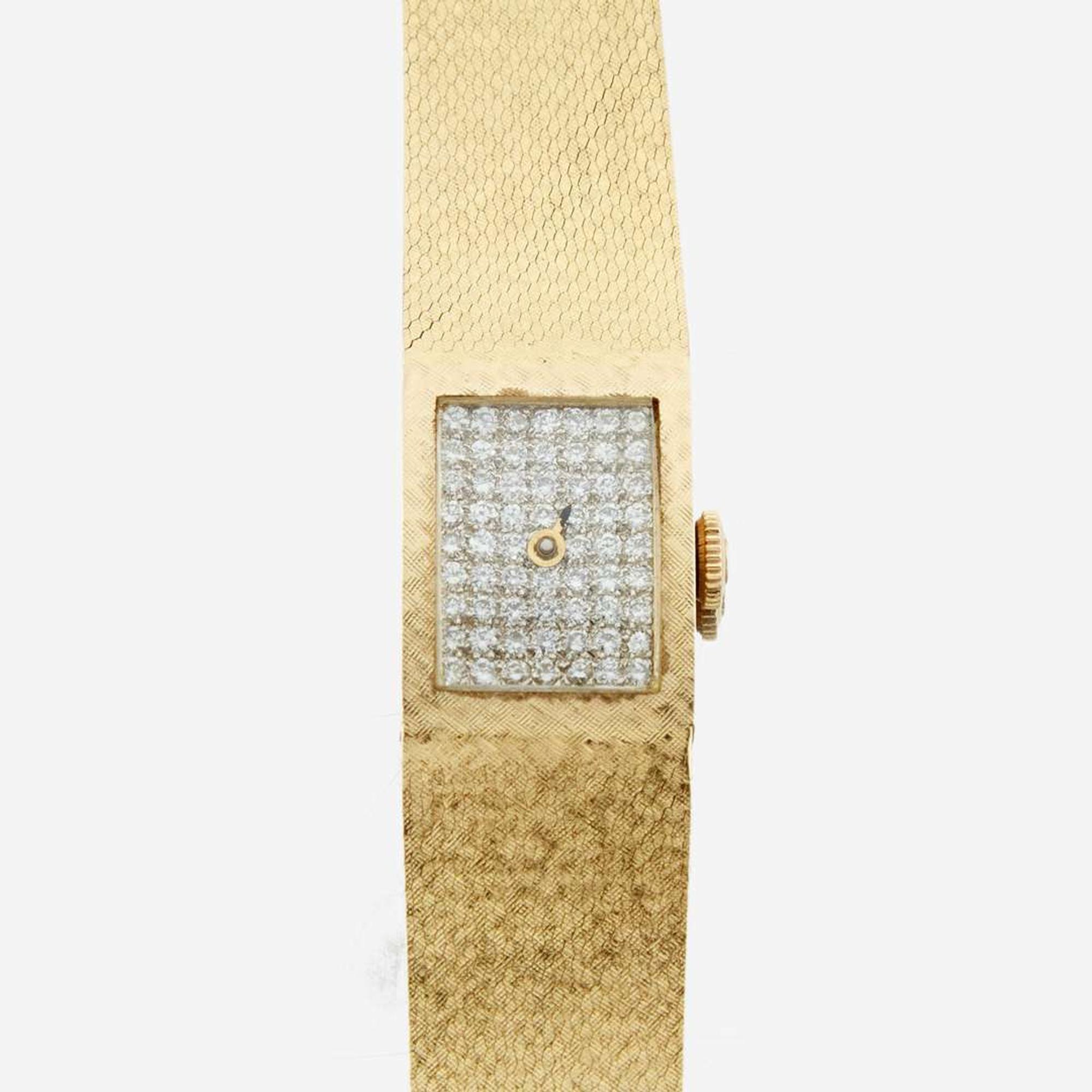 A lady's gold and diamond bracelet wristwatch, Omega