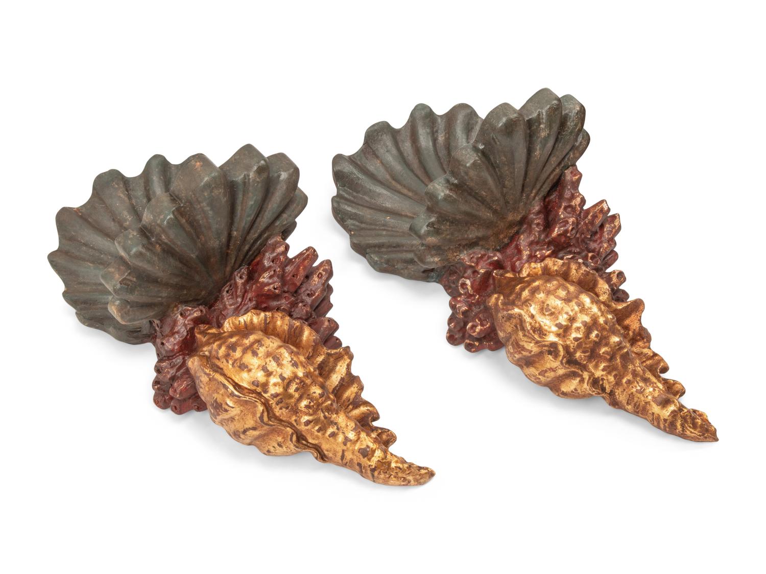 A Set of Four Italian Carved, Painted and Parcel Gilt "Grotto" Style Wall Brackets