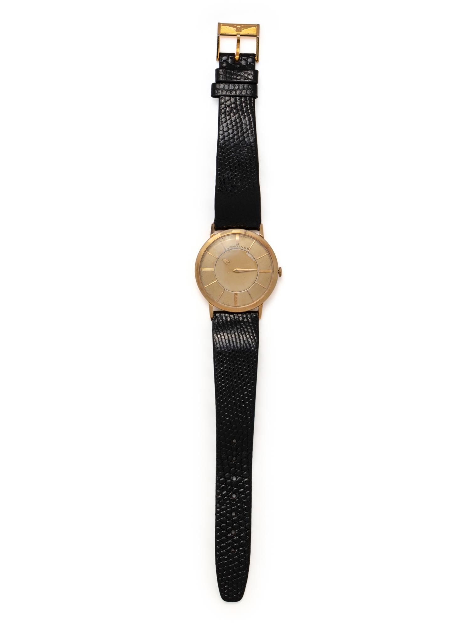 LONGINES, VINTAGE, REF. 1017 14K YELLOW GOLD 'MYSTERY' WRISTWATCH