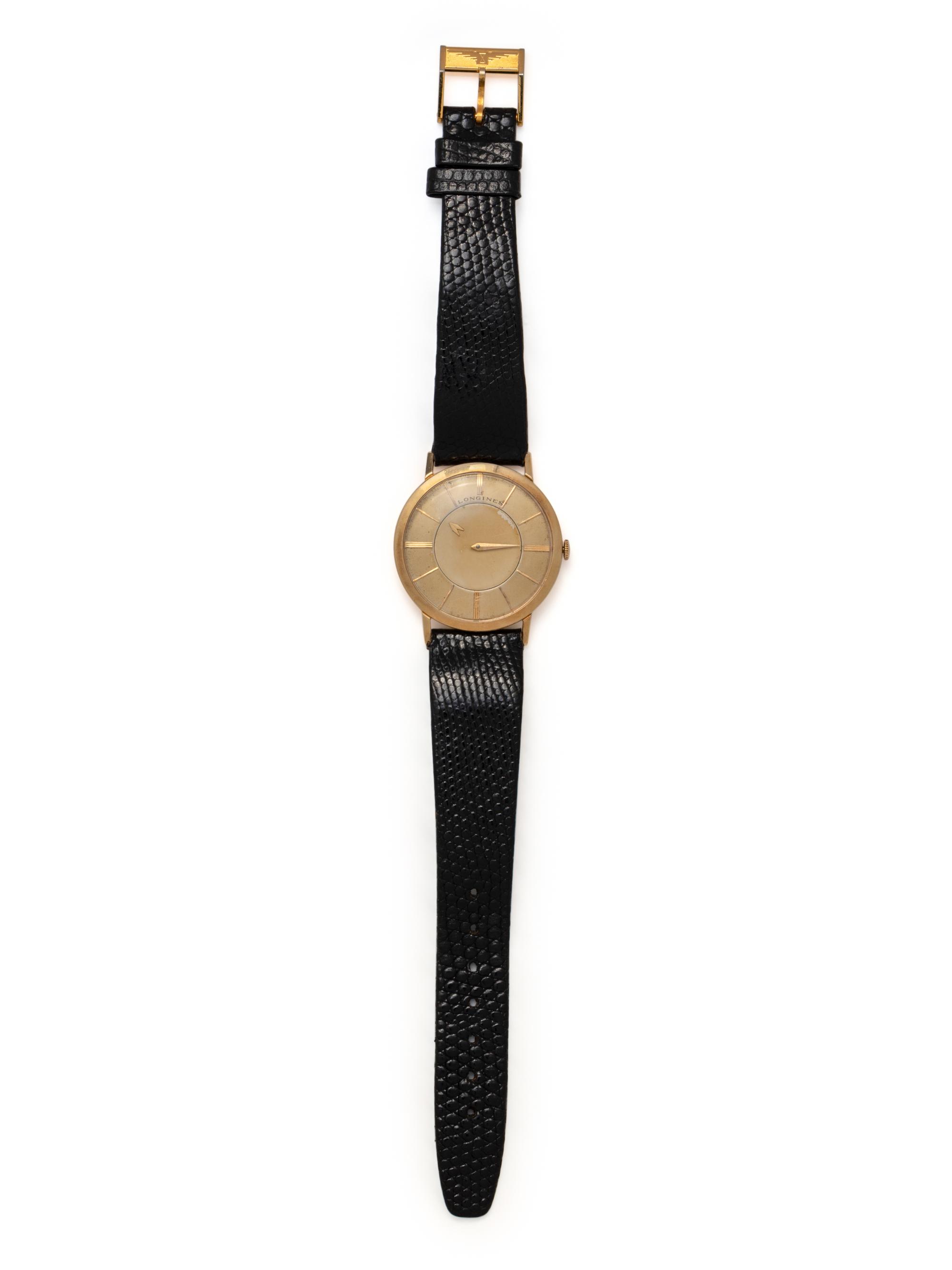 LONGINES, VINTAGE, REF. 1017 14K YELLOW GOLD 'MYSTERY' WRISTWATCH