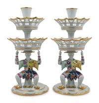 A Pair of Mottahedeh Parcel Gilt Tobacco Leaf Decorated Porcelain Figural Epergne
