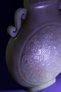 A Rare and Finely Carved Chinese White Jade Covered Vase