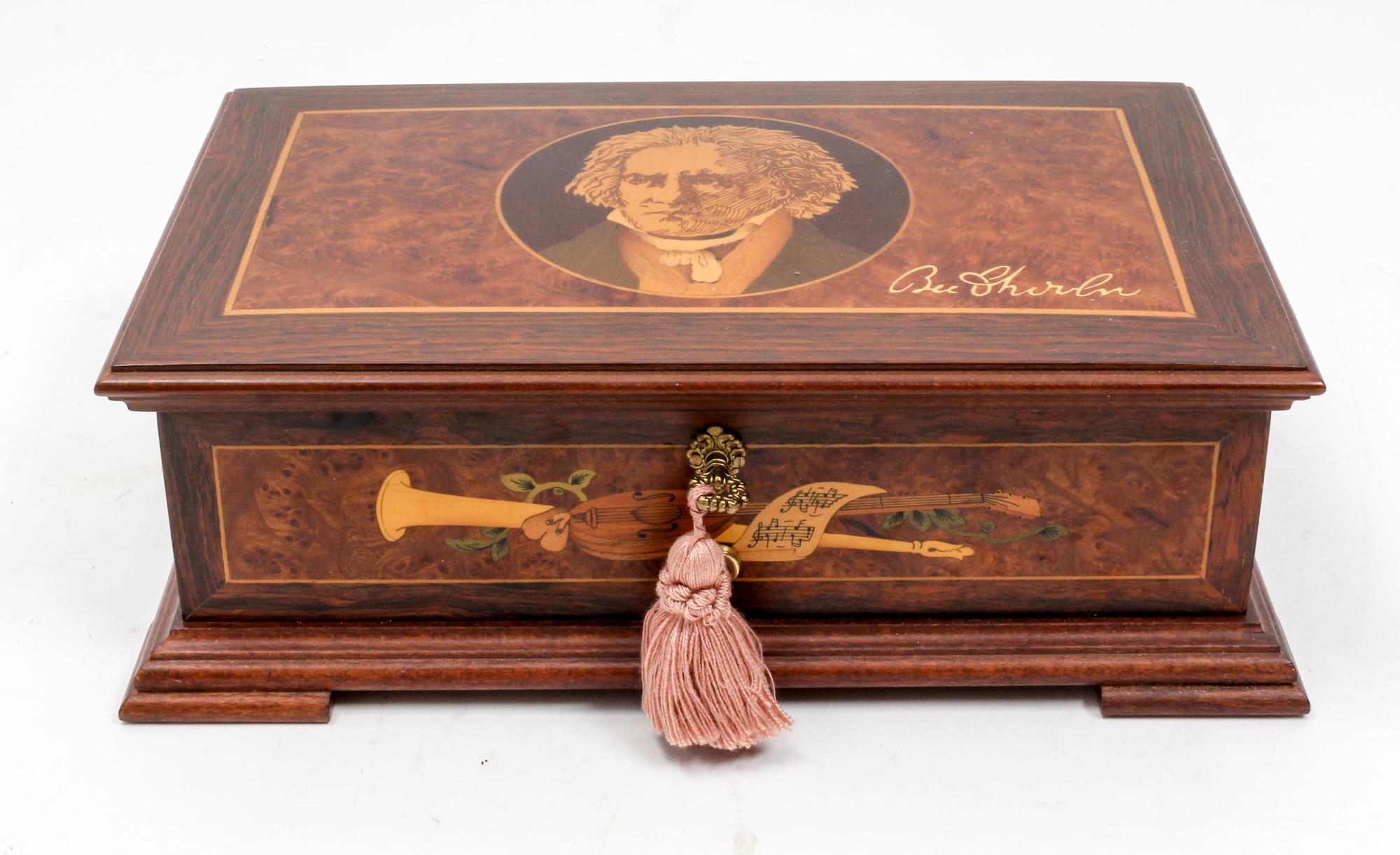 A Marquetry Decorated Music Box Length 11 1/2 inches. — 20TH CENTURY