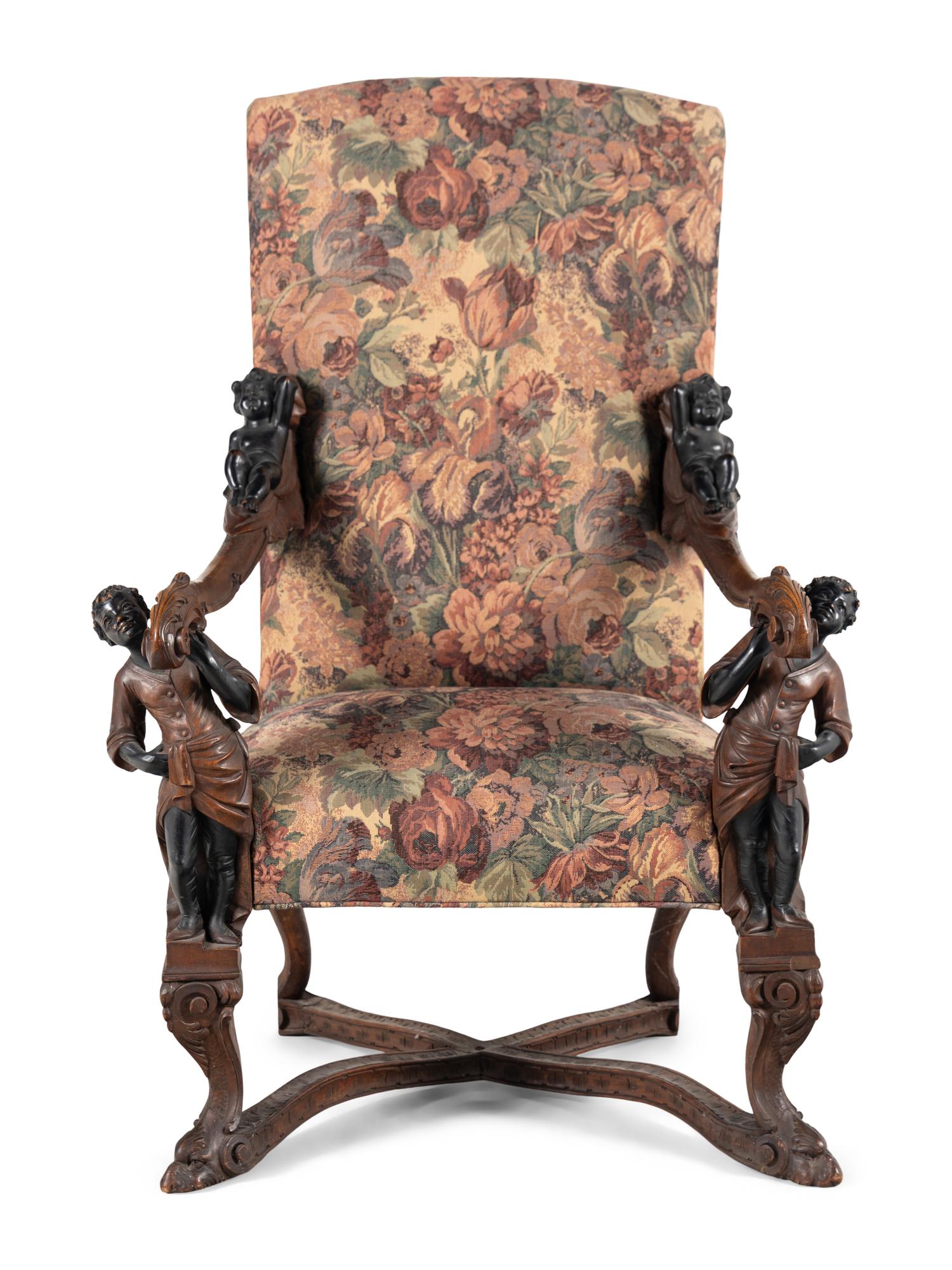 An Italian Baroque Style Carved Walnut Armchair