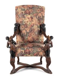 An Italian Baroque Style Carved Walnut Armchair