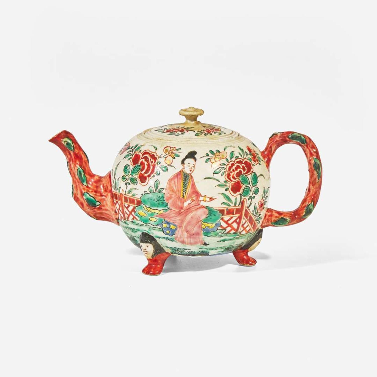A salt-glazed stoneware teapot with Chinoiserie decoration circa 1760