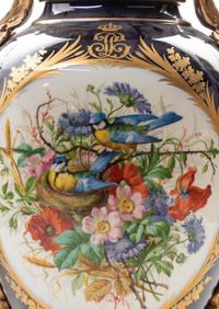 A Sèvres Style Gilt Bronze Mounted Painted and Parcel Gilt Porcelain Urn