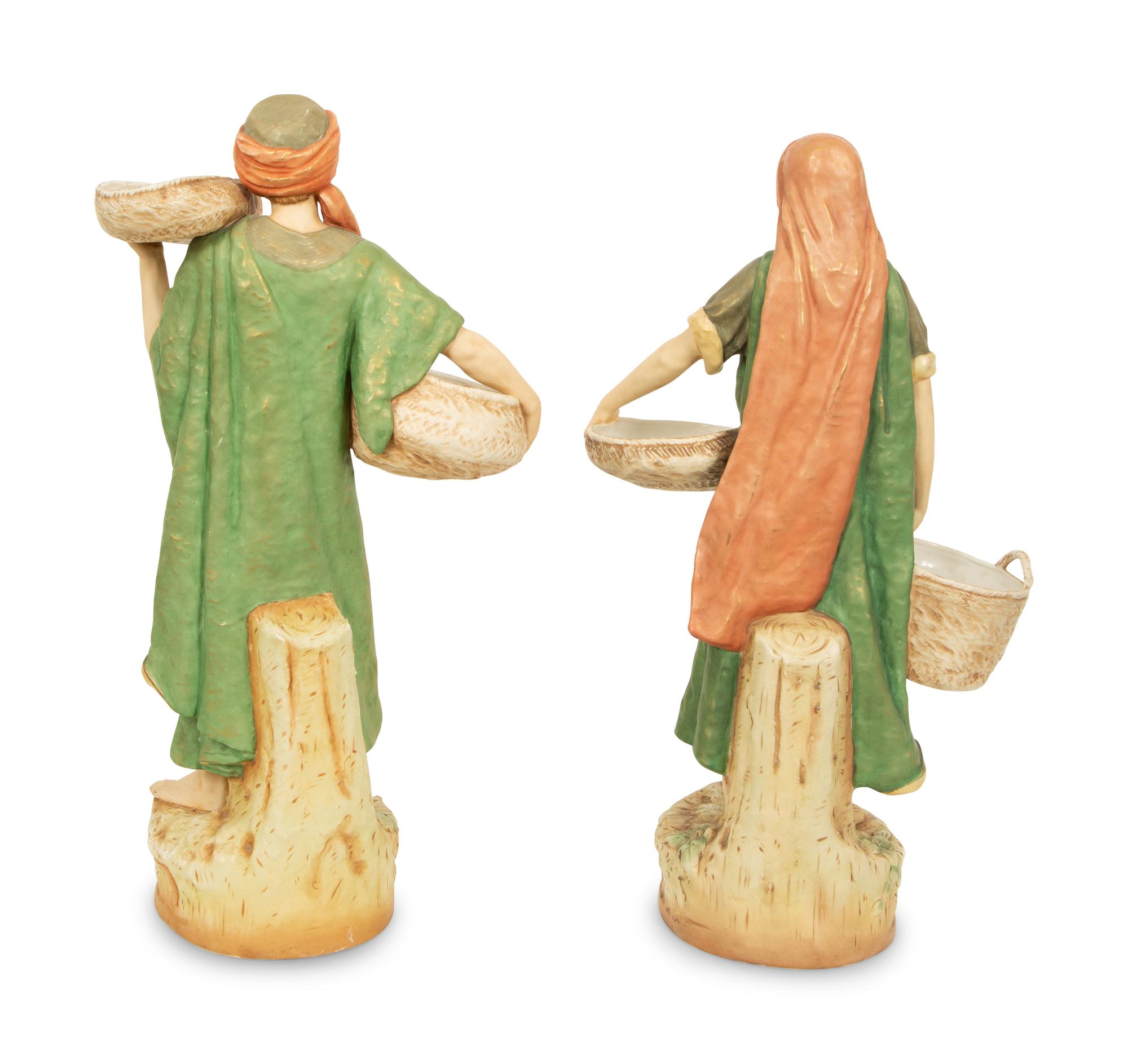 A Pair of Large Royal Dux Porcelain Water Carriers