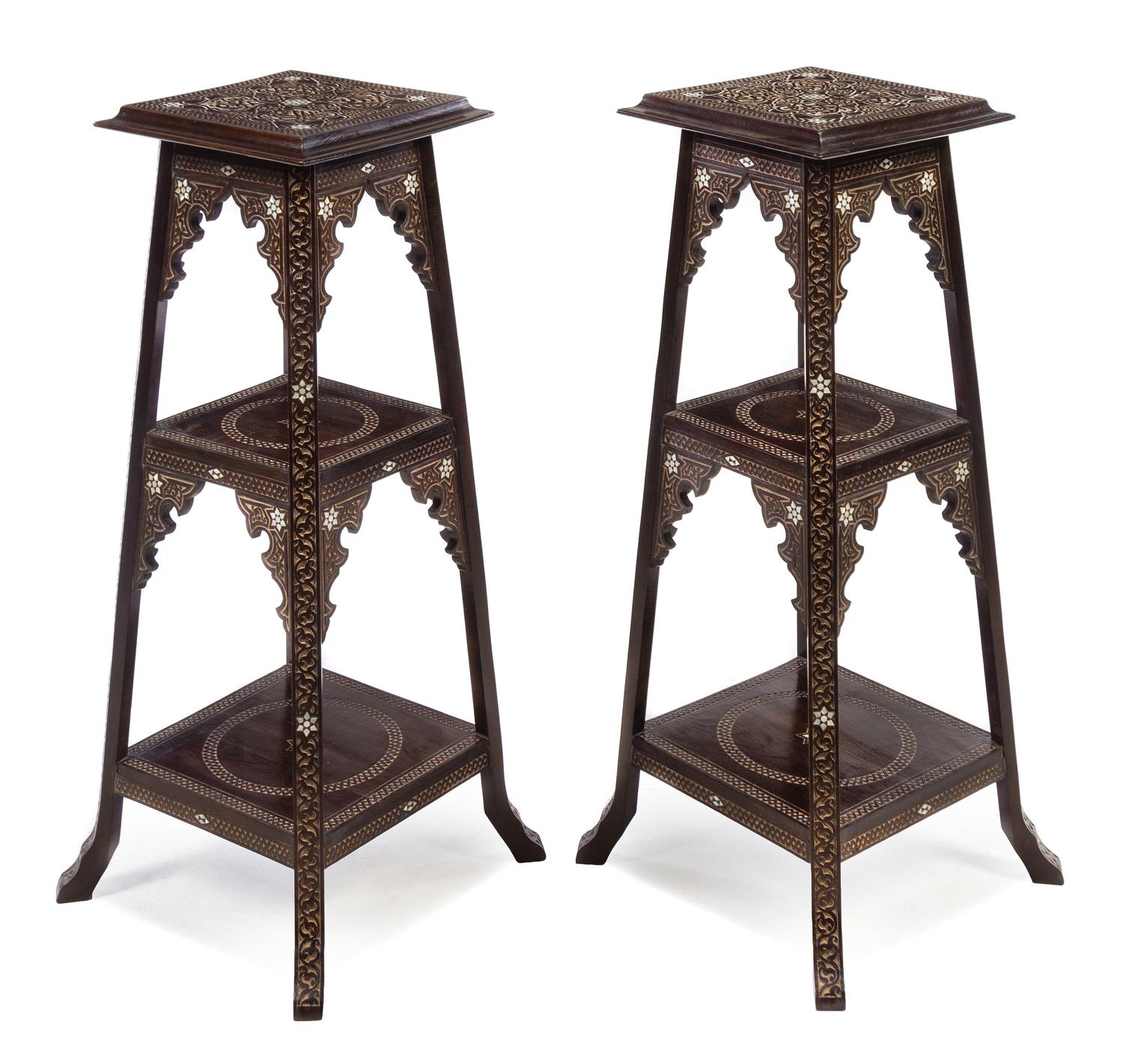 A Pair of Middle Eastern Ebonized and Mother-of-Pearl Inlaid Pedestal Tables Height 40 inches. — 20TH CENTURY